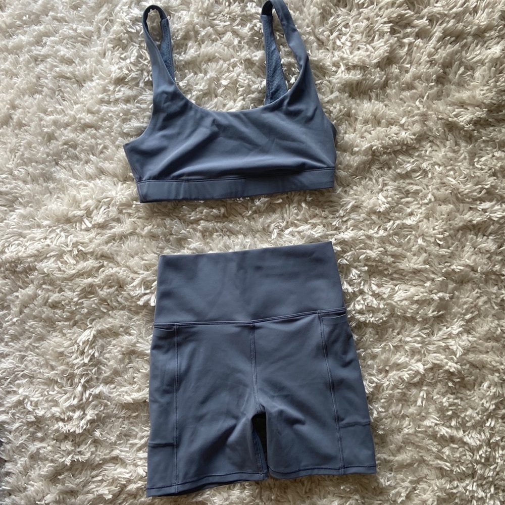 VUORI Studio Pocket Short AND Daily Bra in color Light Azure